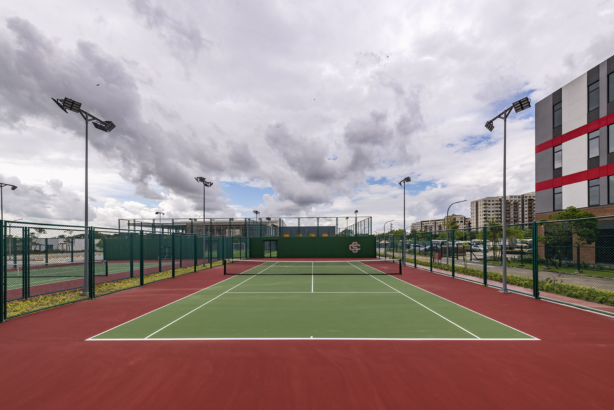 a tennis court of starcity sports club