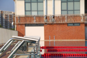 a side picture of starting blocks of Olympic-sized swimming pool