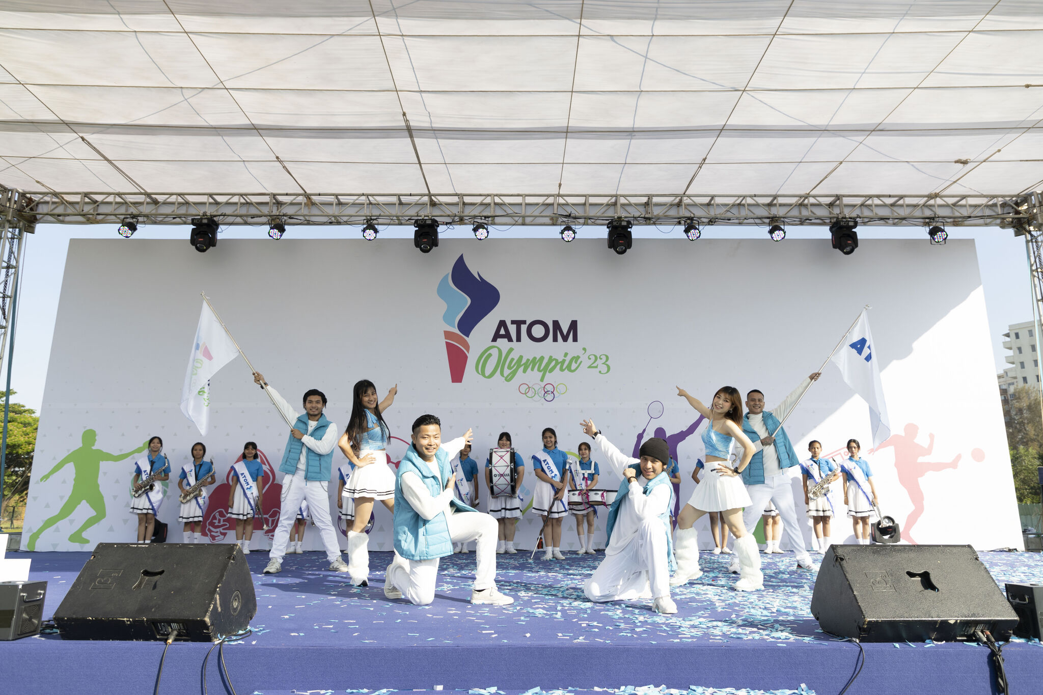 a group of people performing on a stage